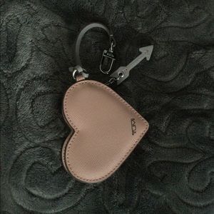 TUMI pink heart shaped coin pouch